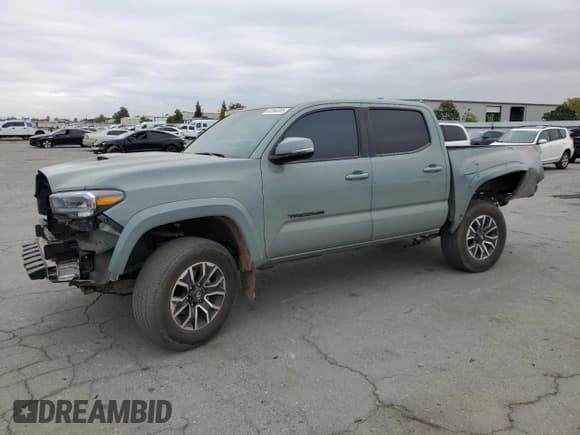 ✅ 2023 Toyota Tacoma TRD Sport • VIN: 3TMCZ5AN2PM602738 • Lot: 82590385. Listed on Copart with 34,093 mi. Free auction sales archive from the USA and detailed vehicle history report at DreamBid. Image 1.