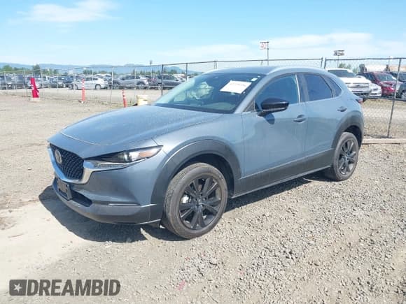 ✅ 2022 Mazda CX-30 S Carbon Edition • VIN: 3MVDMBCL8NM422737 • Lot: 42229336. Listed on IAAI with 14,665 mi. Free auction sales archive from the USA and detailed vehicle history report at DreamBid. Image 2.
