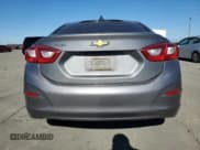 ✅ 2018 Chevrolet Cruze LT • VIN: 1G1BE5SM5J7136150 • Lot: 82736055. Listed on Copart with 138,719 mi. Free auction sales archive from the USA and detailed vehicle history report at DreamBid. Image 6.