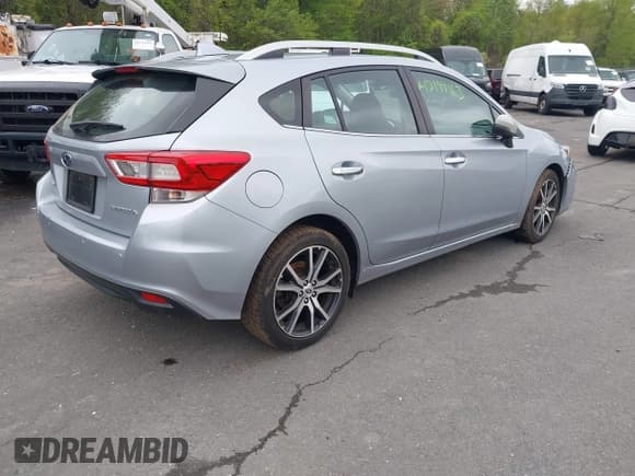 ✅ 2018 Subaru Impreza Limited • VIN: 4S3GTAT65J3731857 • Lot: 42199163. Listed on IAAI with 62,621 mi. Free auction sales archive from the USA and detailed vehicle history report at DreamBid. Image 4.