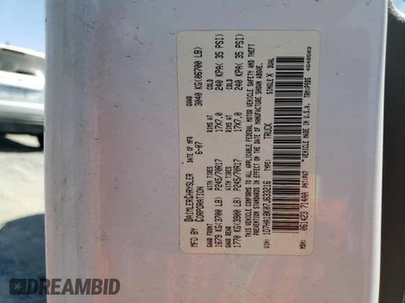 2007 Dodge 1500 ST z VIN 1D7HA18K07J633216, wystawiony jako Copart lot #67059255 z przebiegiem 223 898 mil mil oraz Szkoda całkowita • Salvage title. Historia ofert i sprzedaży dostępna na DreamBid. Obrazek 12.