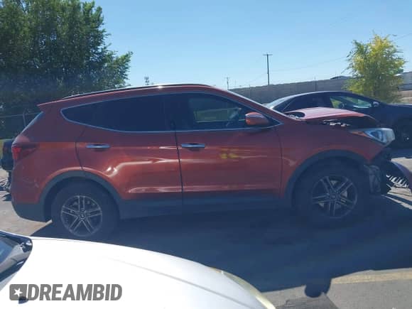 2018 Hyundai Santa Fe 2.4L z VIN 5XYZU3LB8JG523000, wystawiony jako IAAI lot #43263685 z przebiegiem 96 480 mil mil oraz . Historia ofert i sprzedaży dostępna na DreamBid. Obrazek 13.