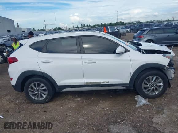2018 Hyundai Tucson SEL with VIN KM8J33A44JU655654, listed as a IAAI auction lot 42590409 with 130,295 mi miles and . Bid and sale history available at DreamBid. Image 14.