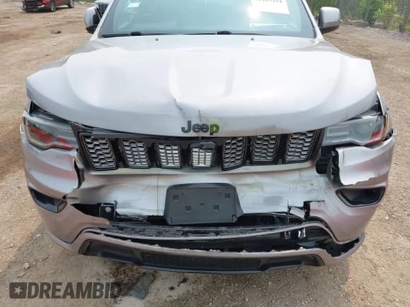 ✅ 2020 Jeep Grand Cherokee Laredo E • VIN: 1C4RJFAG7LC427620 • Lot: 42403254. Listed on IAAI with 34,414 mi. Free auction sales archive from the USA and detailed vehicle history report at DreamBid. Image 6.