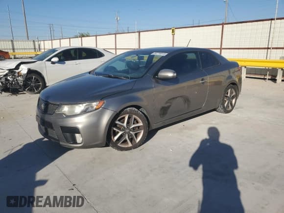 ✅ 2010 Kia Forte SX • VIN: KNAFW6A31A5138863 • Lot: 89776915. Wystawiony na Copart z przebiegiem 209 894 mil. Bezpłatny archiwum sprzedaży aukcyjnych z USA i szczegółowy raport historii pojazdu na DreamBid. Zdjęcie 1.