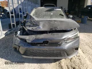 ✅ 2024 Honda Civic EX • VIN: 2HGFE1F71RH327930 • Лот: 91776285. Опубликован ранее на Copart с пробегом 75 671 миль. Бесплатный доступ к архиву аукционных продаж из США и подробный отчёт об истории автомобиля на DreamBid. Изображение 5.