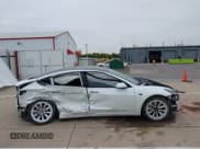 ✅ 2023 Tesla Model 3 • VIN: 5YJ3E1EA3PF563240 • Lot: 43466979. Listed on IAAI with 32,596 mi. Free auction sales archive from the USA and detailed vehicle history report at DreamBid. Image 13.