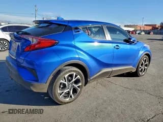✅ 2018 Toyota C-HR XLE • VIN: NMTKHMBX5JR052854 • Лот: 94674945. Опубликован ранее на Copart с пробегом 131 904 миль. Бесплатный доступ к архиву аукционных продаж из США и подробный отчёт об истории автомобиля на DreamBid. Изображение 3.