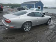 ✅ 2000 Jaguar XK • VIN: SAJJA41B6YPA01802 • Lot: 57146745. Listed on Copart with 32,208 mi. Free auction sales archive from the USA and detailed vehicle history report at DreamBid. Image 3.