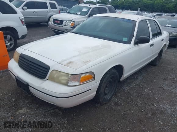 ✅ 2000 Ford Crown Victoria Police Interceptor • VIN: 2FAFP71W5YX204281 • Лот: 42533803. Опубликован ранее на IAAI с пробегом 128 268 миль. Бесплатный доступ к архиву аукционных продаж из США и подробный отчёт об истории автомобиля на DreamBid. Изображение 2.