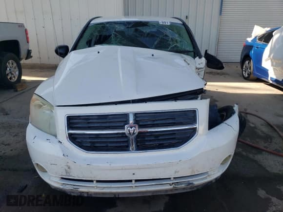 ✅ 2008 Dodge Caliber SE • VIN: 1B3HB28B78D757837 • Лот: 69117744. Опубликован ранее на Copart с пробегом Не указан. Бесплатный доступ к архиву аукционных продаж из США и подробный отчёт об истории автомобиля на DreamBid. Изображение 5.