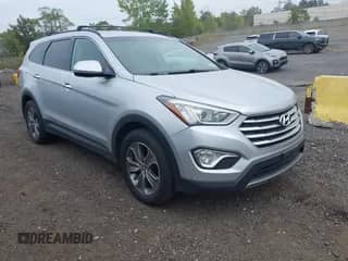 2016 Hyundai Santa Fe SE z VIN KM8SMDHF5GU153257, wystawiony jako IAAI lot #43311596 z przebiegiem 123 409 mil mil oraz . Historia ofert i sprzedaży dostępna na DreamBid. Obrazek 1.