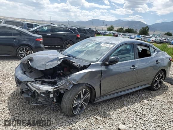 ✅ 2023 Nissan Sentra SR • VIN: 3N1AB8DV1PY238896 • Лот: 60670285. Опубликован ранее на Copart с пробегом 59 025 миль. Бесплатный доступ к архиву аукционных продаж из США и подробный отчёт об истории автомобиля на DreamBid. Изображение 1.