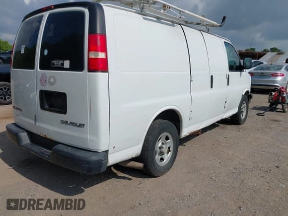 ✅ 2005 Chevrolet Express Cargo • VIN: 1GCFG15X351177337 • Lot: 42797099. Listed on IAAI with 213,881 mi. Free auction sales archive from the USA and detailed vehicle history report at DreamBid. Image 4.