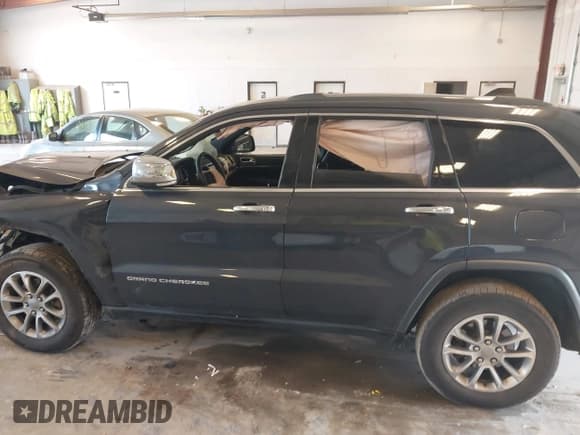 ✅ 2015 Jeep Grand Cherokee Limited • VIN: 1C4RJFBG0FC854611 • Lot: 42915098. Listed on IAAI with 144,057 mi. Free auction sales archive from the USA and detailed vehicle history report at DreamBid. Image 14.