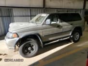 ✅ 2002 Mitsubishi Montero Sport ES • VIN: JA4LS21H32J058330 • Lot: 83523844. Listed on Copart with 186,781 mi. Free auction sales archive from the USA and detailed vehicle history report at DreamBid. Image 1.