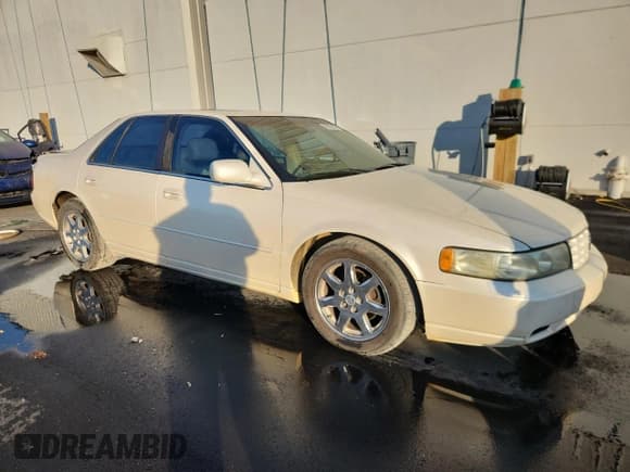 ✅ 2003 Cadillac Seville Touring STS • VIN: 1G6KY54973U208920 • Lot: 92802255. Wystawiony na Copart z przebiegiem 274 567 mil. Bezpłatny archiwum sprzedaży aukcyjnych z USA i szczegółowy raport historii pojazdu na DreamBid. Zdjęcie 4.