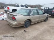 ✅ 1996 Oldsmobile Cutlass Supreme S • VIN: 1G3WH52M9TF377685 • Lot: 41496775. Wystawiony na IAAI z przebiegiem 197 366 mil. Bezpłatny archiwum sprzedaży aukcyjnych z USA i szczegółowy raport historii pojazdu na DreamBid. Zdjęcie 4.