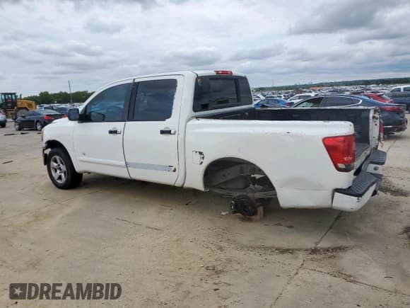 ✅ 2005 Nissan Titan LE • VIN: 1N6BA07A45N572068 • Lot: 58378445. Listed on Copart with 219,838 mi. Free auction sales archive from the USA and detailed vehicle history report at DreamBid. Image 2.