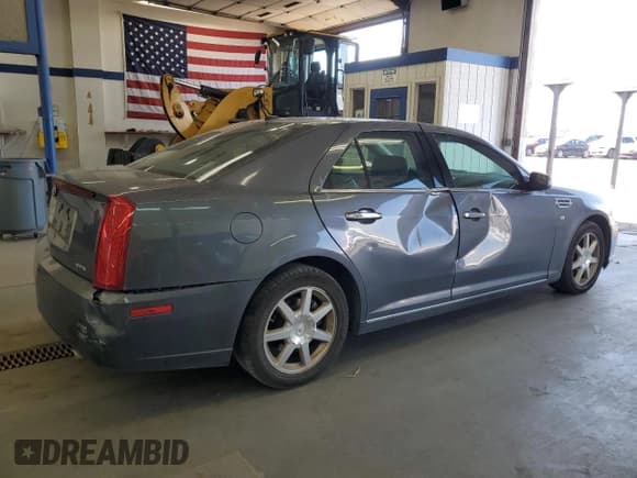 ✅ 2008 Cadillac STS RWD • VIN: 1G6DC67AX80193413 • Lot: 62383775. Listed on Copart with 153,575 mi. Free auction sales archive from the USA and detailed vehicle history report at DreamBid. Image 3.