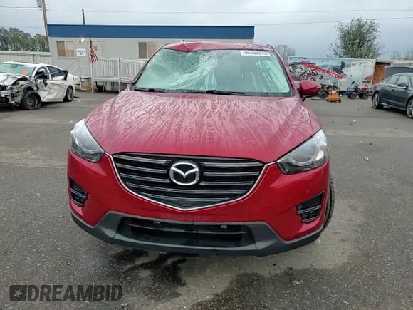 ✅ 2016 Mazda CX-5 Grand Touring • VIN: JM3KE4DY4G0701238 • Lot: 90460315. Listed on Copart with 73,557 mi. Free auction sales archive from the USA and detailed vehicle history report at DreamBid. Image 14.