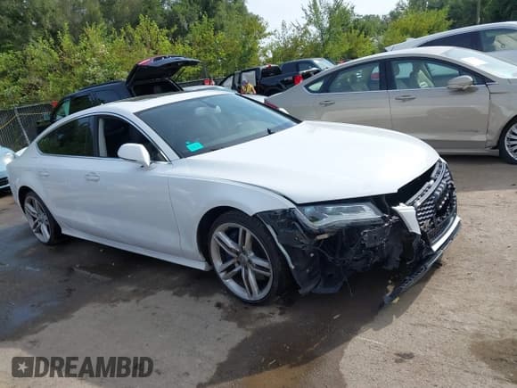 ✅ 2012 Audi A7 Prestige • VIN: WAUSGAFC2CN028835 • Lot: 43054083. Listed on IAAI with 113,832 mi. Free auction sales archive from the USA and detailed vehicle history report at DreamBid. Image 1.