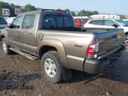 ✅ 2012 Toyota Tacoma PreRunner • VIN: 3TMJU4GNXCM128023 • Lot: 43136343. Listed on IAAI with 134,815 mi. Free auction sales archive from the USA and detailed vehicle history report at DreamBid. Image 3.