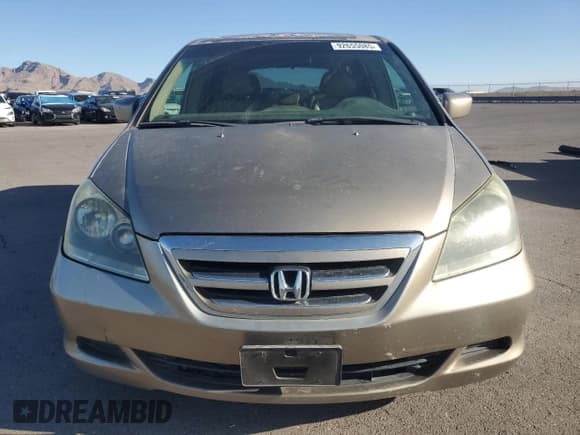 ✅ 2005 Honda Odyssey EX-L • VIN: 5FNRL38705B097212 • Лот: 92655085. Опубликован ранее на Copart с пробегом 162 776 миль. Бесплатный доступ к архиву аукционных продаж из США и подробный отчёт об истории автомобиля на DreamBid. Изображение 5.