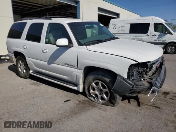 ✅ 2001 GMC Yukon Denali • VIN: 1GKEK63U61J186208 • Lot: 70895394. Listed on Copart with 207,395 mi. Free auction sales archive from the USA and detailed vehicle history report at DreamBid. Image 4.