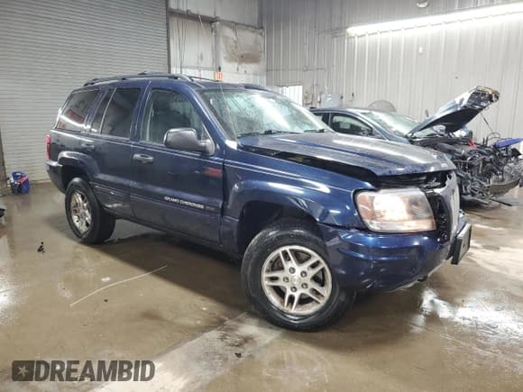 ✅ 2004 Jeep Grand Cherokee Laredo • VIN: 1J4GW48N94C275420 • Lot: 92297595. Listed on Copart with 213,183 mi. Free auction sales archive from the USA and detailed vehicle history report at DreamBid. Image 4.