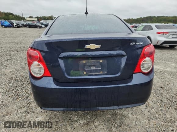 ✅ 2016 Chevrolet Sonic LS • VIN: 1G1JA5SH9G4148211 • Lot: 82619965. Listed on Copart with 84,000 mi. Free auction sales archive from the USA and detailed vehicle history report at DreamBid. Image 6.