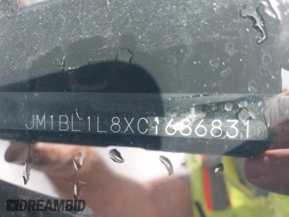 ✅ 2012 Mazda 3 i Touring • VIN: JM1BL1L8XC1686831 • Lot: 42373850. Listed on IAAI with 152,067 mi. Free auction sales archive from the USA and detailed vehicle history report at DreamBid. Image 9.