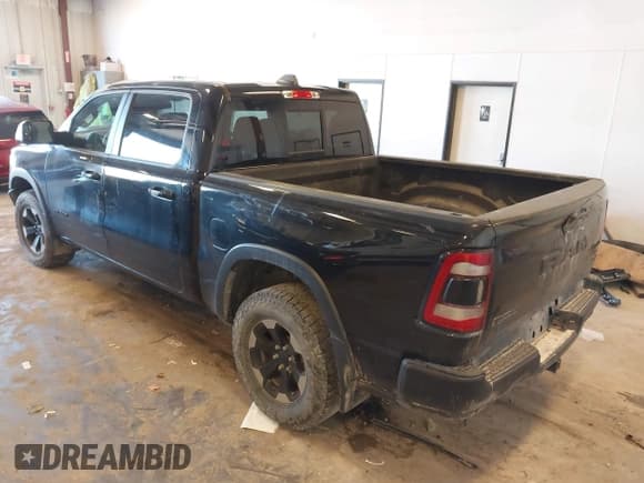 ✅ 2019 Ram 1500 Rebel • VIN: 1C6SRFLT7KN542362 • Lot: 43402661. Listed on IAAI with 132,846 mi. Free auction sales archive from the USA and detailed vehicle history report at DreamBid. Image 3.
