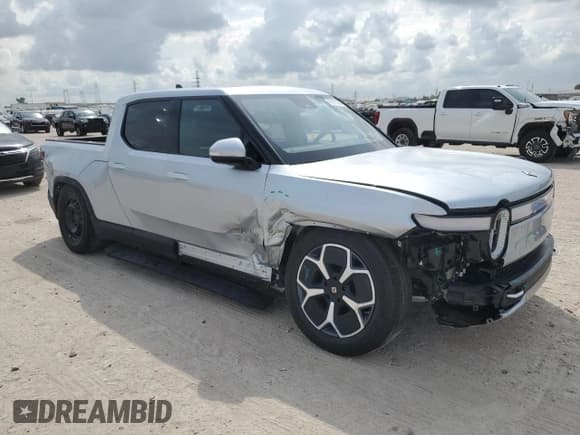 ✅ 2023 Rivian R1T Adventure • VIN: 7FCTGAAA1PN020612 • Lot: 72971044. Wystawiony na Copart z przebiegiem 7 858 mil. Bezpłatny archiwum sprzedaży aukcyjnych z USA i szczegółowy raport historii pojazdu na DreamBid. Zdjęcie 4.