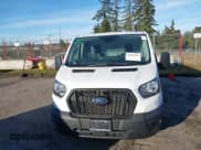 ✅ 2021 Ford Transit Cargo • VIN: 1FTYE1Y89MKA16809 • Lot: 41643195. Listed on IAAI with 7,407 mi. Free auction sales archive from the USA and detailed vehicle history report at DreamBid. Image 12.