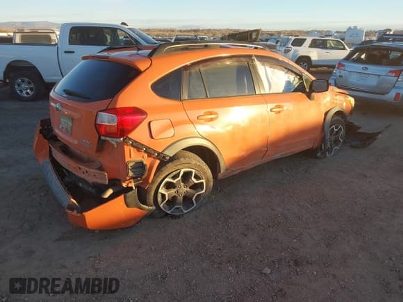 ✅ 2013 Subaru Crosstrek Premium • VIN: JF2GPAVC1D2835751 • Lot: 40911091. Listed on IAAI with 104,066 mi. Free auction sales archive from the USA and detailed vehicle history report at DreamBid. Image 4.
