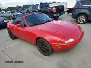 ✅ 1991 Mazda MX-5 Miata Special Edition • VIN: JM1NA3515M1219378 • Lot: 77085934. Listed on Copart with Not provided. Free auction sales archive from the USA and detailed vehicle history report at DreamBid. Image 4.