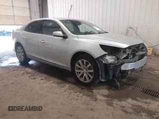 2013 Chevrolet Malibu LTZ z VIN 1G11H5SA8DF267897, wystawiony jako IAAI lot #42962625 z przebiegiem 227 832 mil mil oraz . Historia ofert i sprzedaży dostępna na DreamBid. Obrazek 1.