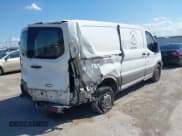 ✅ 2015 Ford Transit Cargo • VIN: 1FTNE1YM7FKA17475 • Lot: 42462385. Listed on IAAI with 247,034 mi. Free auction sales archive from the USA and detailed vehicle history report at DreamBid. Image 4.