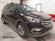 2017 Hyundai Santa Fe 2.0T z VIN 5XYZUDLA9HG433491, wystawiony jako IAAI lot #43298379 z przebiegiem 135 099 mil mil oraz . Historia ofert i sprzedaży dostępna na DreamBid. Obrazek 1.