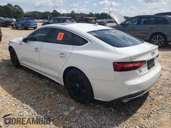 ✅ 2020 Audi A5 Sportback Premium Plus • VIN: WAUCNCF59LA002229 • Lot: 85777585. Listed on Copart with 67,872 mi. Free auction sales archive from the USA and detailed vehicle history report at DreamBid. Image 2.