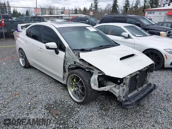 ✅ 2018 Subaru WRX STI Limited • VIN: JF1VA2W63J9831795 • Lot: 41923446. Listed on IAAI with 112,927 mi. Free auction sales archive from the USA and detailed vehicle history report at DreamBid. Image 1.