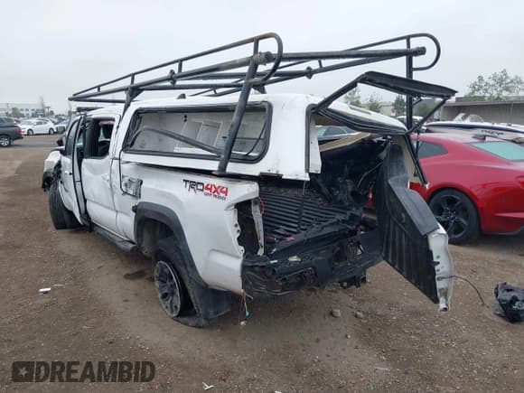 ✅ 2019 Toyota Tacoma SR5 • VIN: 3TMDZ5BN0KM069526 • Lot: 41911650. Listed on IAAI with 104,430 mi. Free auction sales archive from the USA and detailed vehicle history report at DreamBid. Image 3.
