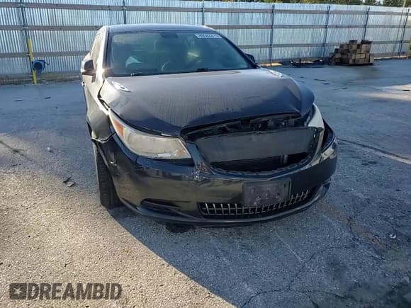 ✅ 2013 Buick LaCrosse • VIN: 1G4GA5ER8DF211784 • Lot: 89502315. Wystawiony na Copart z przebiegiem 186 694 mil. Bezpłatny archiwum sprzedaży aukcyjnych z USA i szczegółowy raport historii pojazdu na DreamBid. Zdjęcie 13.