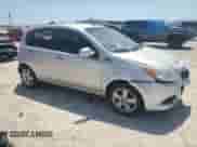 2009 Chevrolet Aveo 1LT with VIN KL1TD66E09B338773, listed as a Copart auction lot 52575765 with 102,617 mi miles and Salvage title. Bid and sale history available at DreamBid. Image 4.