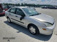 ✅ 2004 Ford Focus LX • VIN: 1FAFP33P44W149486 • Lot: 64574755. Wystawiony na Copart z przebiegiem 129 681 mil. Bezpłatny archiwum sprzedaży aukcyjnych z USA i szczegółowy raport historii pojazdu na DreamBid. Zdjęcie 4.