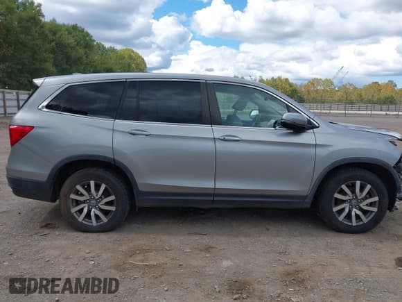 ✅ 2019 Honda Pilot EX-L • VIN: 5FNYF5H57KB031636 • Lot: 43281103. Listed on IAAI with 89,628 mi. Free auction sales archive from the USA and detailed vehicle history report at DreamBid. Image 13.
