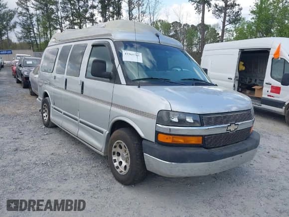 ✅ 2004 Chevrolet Express Passenger • VIN: 1GBFG15T241154485 • Lot: 41965765. Listed on IAAI with 186,737 mi. Free auction sales archive from the USA and detailed vehicle history report at DreamBid. Image 1.
