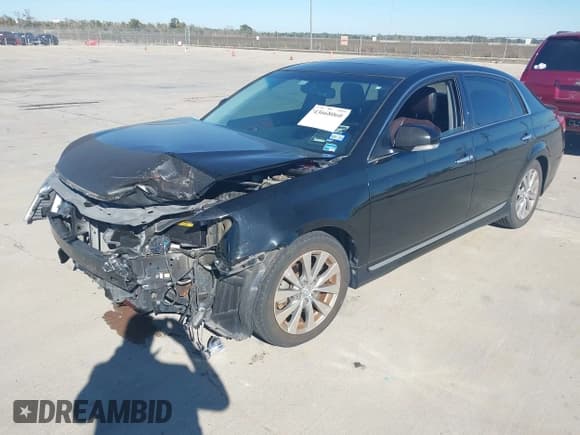 ✅ 2012 Toyota Avalon • VIN: 4T1BK3DB7CU457980 • Lot: 43668060. Listed on IAAI with 89,930 mi. Free auction sales archive from the USA and detailed vehicle history report at DreamBid. Image 2.