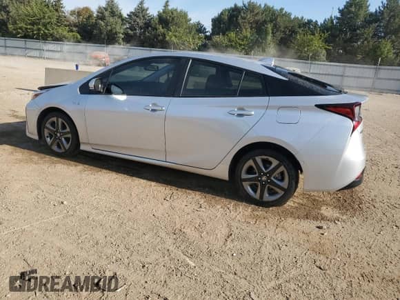 2021 Toyota Prius L Eco с VIN JTDKAMFU1M3138206, выставлен на аукционе Copart как лот 80360175 с пробегом 67 910 миль миль и Списание • Salvage title. История ставок и продаж доступна на DreamBid. Изображение 2.